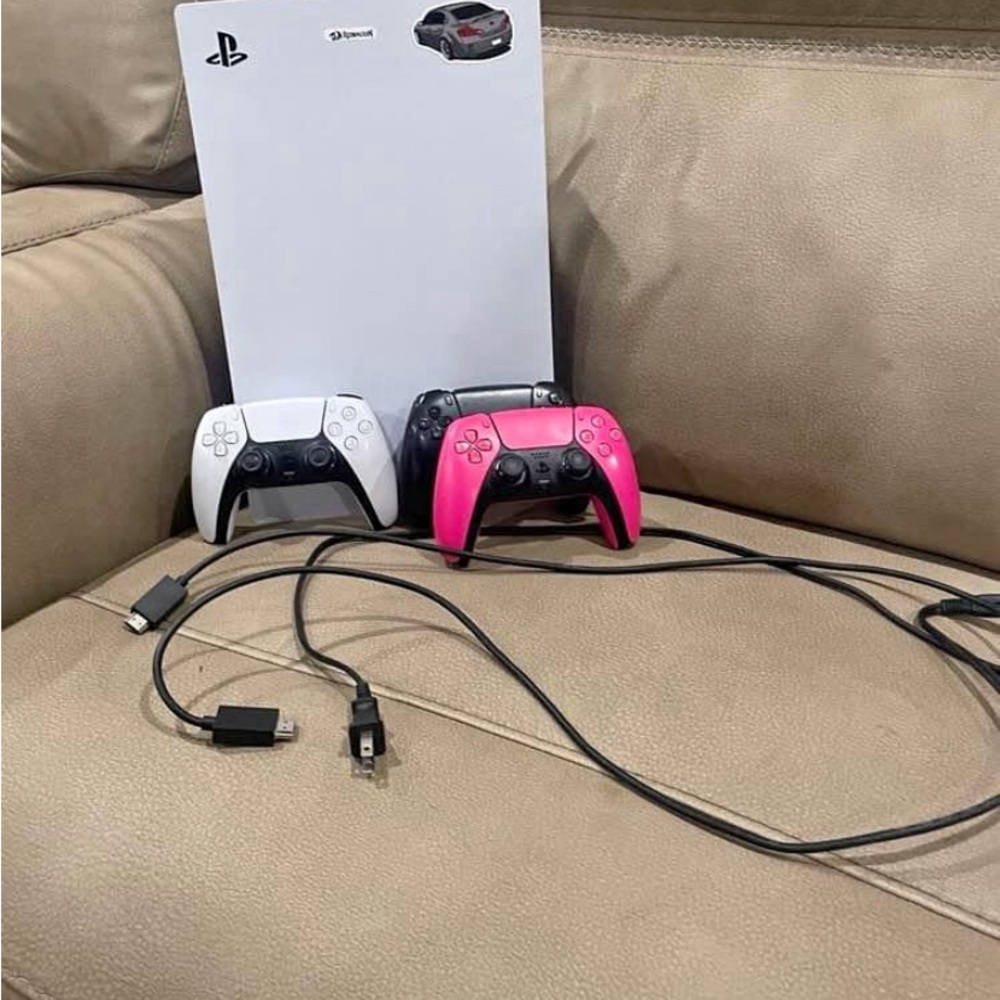 Clean as new PS5 with 3 controllers
